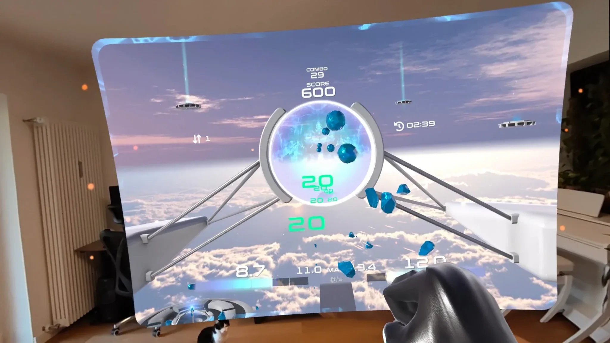 Archived PowerBeatsVR Quest mixed-reality capture showing gameplay in a real room.